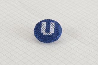 Cross Stitch Alphabet Button, White on Blue, U, 25mm