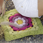 Free Pattern! Seating Pad with Flower in DROPS Eskimo